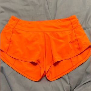 Orange Lulu Lemon shorts